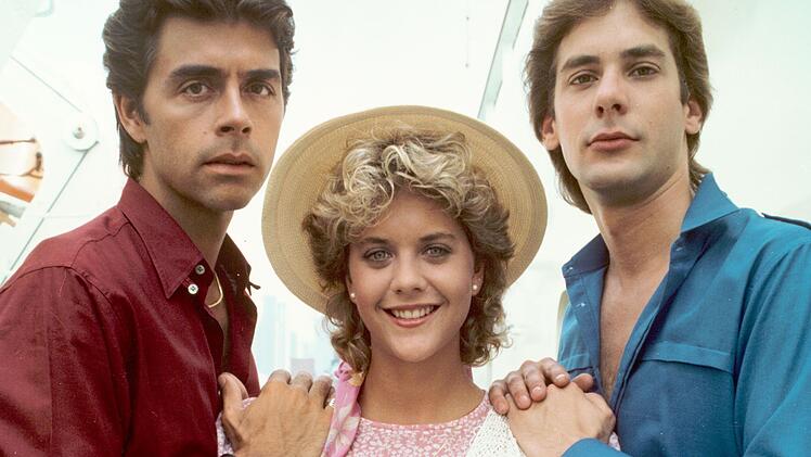 Meg Ryans TV-Hochzeit mit Steve Andropoulos (Frank Runyeon, Bild, links) in der Soap "As The World Turns" sahen 20 Millionen US-Amerikaner.