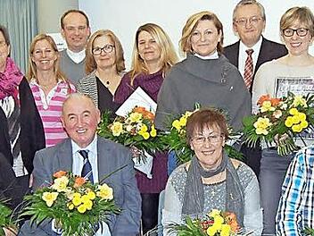 Verdiente Mitarbeiter und der wiedergewählte Vorstand standen im Mittelpunkt der Caritas-Hauptversammlung.