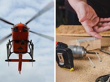Arbeiter durchbohrt sich Arm mit Holzsplitter