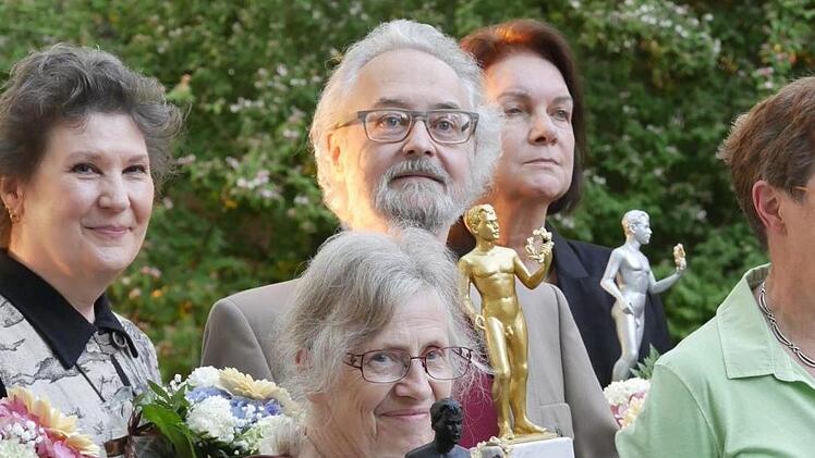 Die Gäste aus den Vereinigten Staaten von Amerika mit dem glänzenden MOA-Award v.li.