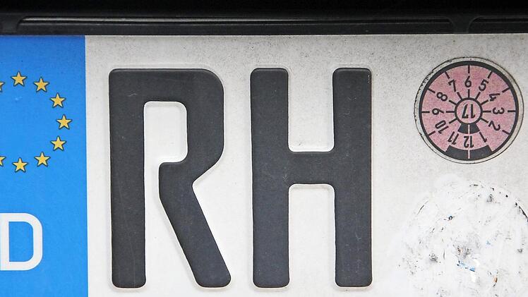 Kennzeichen für den Landkreis Roth, Stempelplakette abgekratzt.