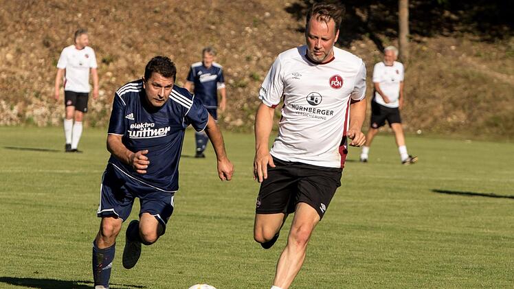 Der N&uuml;rnberger Stephan Giesbert (rechts) liefert sich hier mit einem Kleukheimer ein Laufduell.