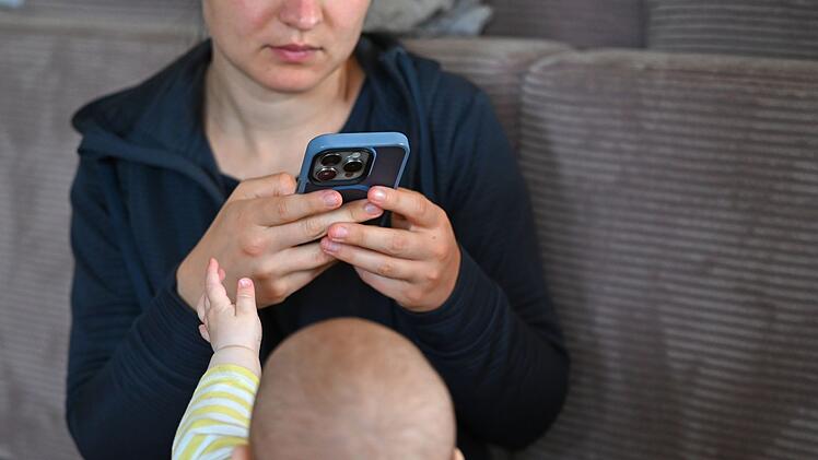 Alltag Mutter mit Baby
