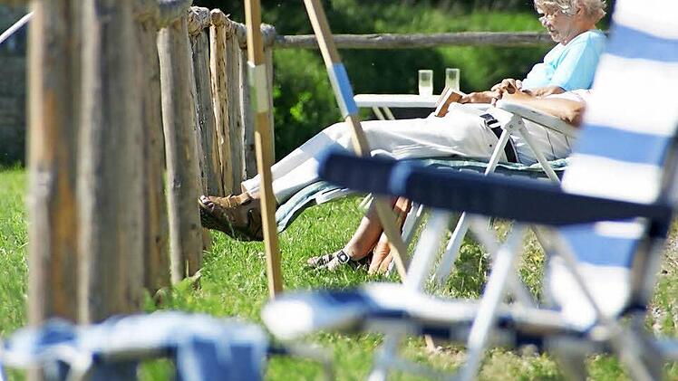 Gäste des Wohnmobilstellplatzes auf dem Bleichrasen. Foto: Archiv/Arkadius Guzy