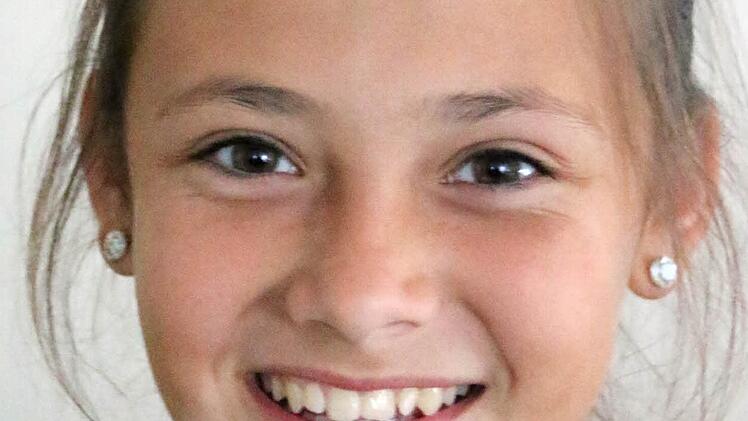 Ana Moore, 6. Klasse: "Früher sind wir mit Tabletts hingerannt, um das Geschirr zu holen. Da fiel auch öfter mal etwas runter." Foto: Bettina Knauth