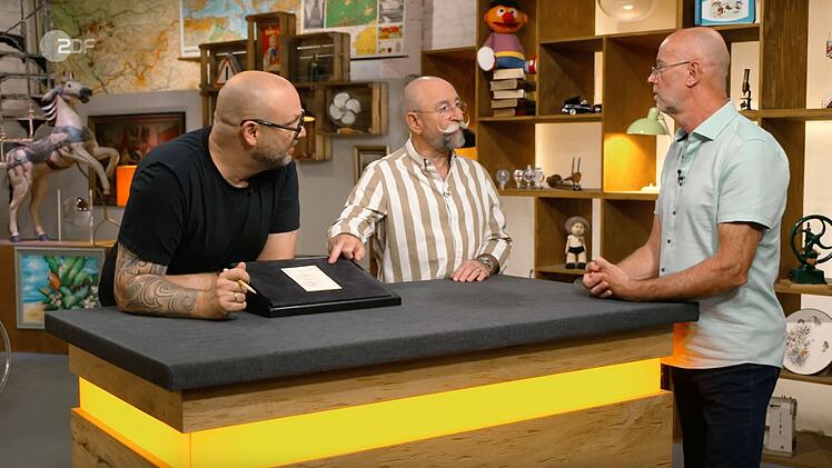 Ein Dokument aus der DDR, sieben Monate Stasi-Haft und die Unterschrift einer echten Musiklegende. In der Mittwochsausgabe der ZDF-Tr&ouml;delshow "Bares f&uuml;r Rares" wurde aus einem Verkaufsobjekt ein "gro&szlig;es St&uuml;ck Zeitgeschichte" und sorgte nicht nur bei Horst Lichter f&uuml;r G&auml;nsehautmomente - obwohl viele fragten: "Warum willst du das denn verkaufen?"