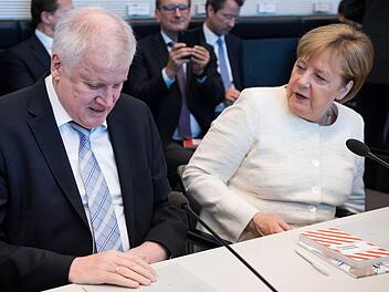Horst Seehofer und Angela Merkel.  Foto: Kay Nietfeld/dpa