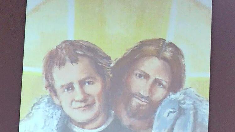 Das Bild in der Kirche zeigt Don Bosco mit Christus.