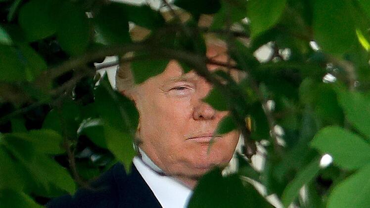 In der Klimapolitik ist es besser, wenn sich US-Präsident Donald Trum versteckt. Foto: Pablo Martinez Monsivais, AP/dpa