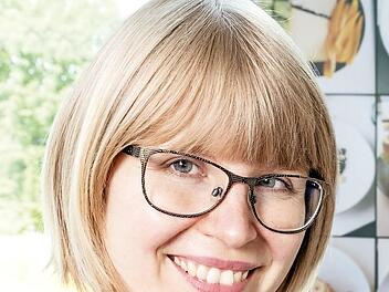 Laura KönigProfessorin