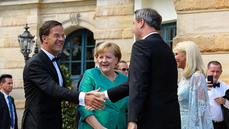 Marc Rutte, Angela Merkel, Markus S&ouml;derFoto: Matthias Balk/ dpa