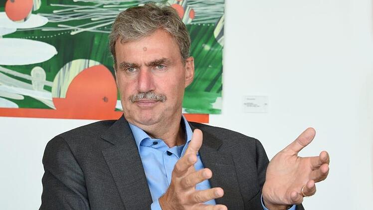 Peter Ottmann im Gespräch mit dem Redakteur Foto: Nürnberg-Messe/Bischof&Broel