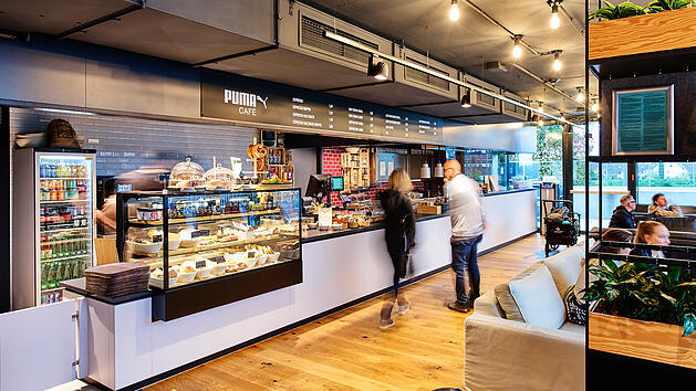Neues Puma-Café in Herzogenauarch eröffnet - besondere Weihnachts-Aktion zum Start