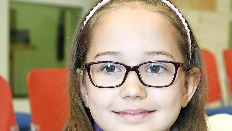Magdalena (8): "Heute ging es um den Nikolaus: Der muss viele Geschenke verpacken. Aber weil der alleine ist, braucht er Helfer. Die besorgen zum Beispiel die Sachen für ihn." Foto: Ronald Rinklef