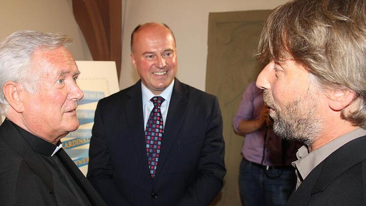 Diözesanbischof Friedhelm Hofmann, Staatssekretär Hartmut Koschyk und Michael Gais (von links)