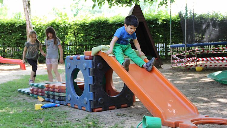 Der dreijährige Enzar fühlt sich im Kindergarten pudelwohl. Foto: Katharina Müller-Sanke
