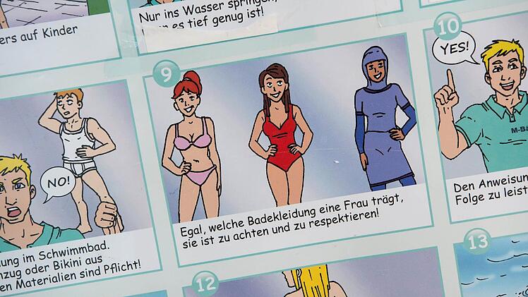 Diese Plakate hängen jetzt in Münchner Schwimmbädern. So etwas gibt es in Coburg aber bisher nicht. Foto: Sven Hoppe, dpa