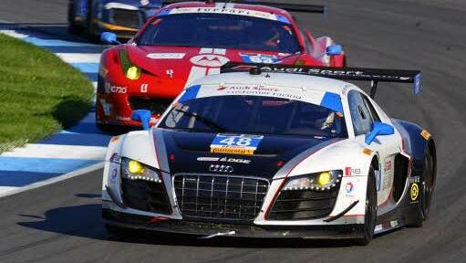 Beim Rennen 2014 in Indianapolis liegen Haase/Miller mit ihrem Audi R8 LMS (vorne) in Führung. Am Ende müssen sie aber den Ferrari von Jeff Westphal und Alessandro Balzan vorbeiziehen lassen und belegen Platz 2. In der kommenden Saison wechselt sich Haase auf dem Fahrersitz mit Dion von Moltke ab. Foto: Archiv