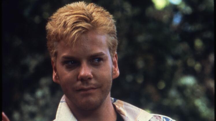 Er ist der Anf&uuml;hrer einer Jugendgang, die ebenfalls versucht, den verschwundenen Jungen zu finden: John "Ace" Merrill (Kiefer Sutherland) kommt den vier Jungs in die Quere, zieht aber den K&uuml;rzeren.