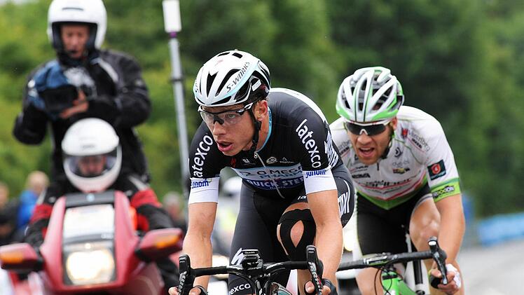 Voll im Medienfokus stand bis zur letzten Runde das Spitzenduo mit Tony Martin (links) und Grischa Janorschke. Foto dpa