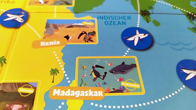 Reise um die Welt mit Wolf - Rezension des Postkarten-Brettspiels für Kinder