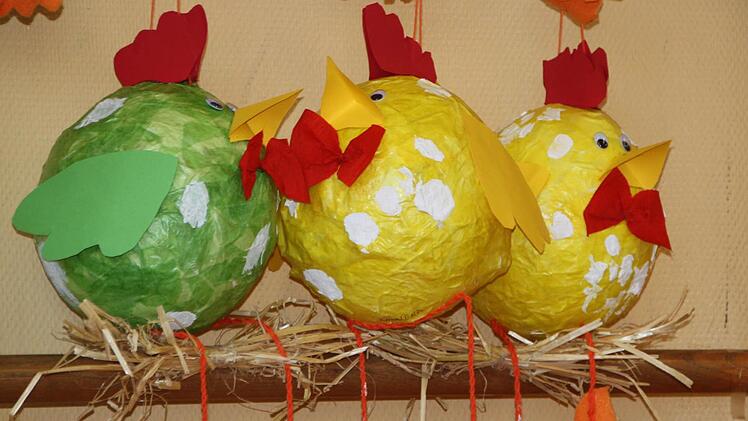 Hühner auf der Stange Foto: Ulrike Müller