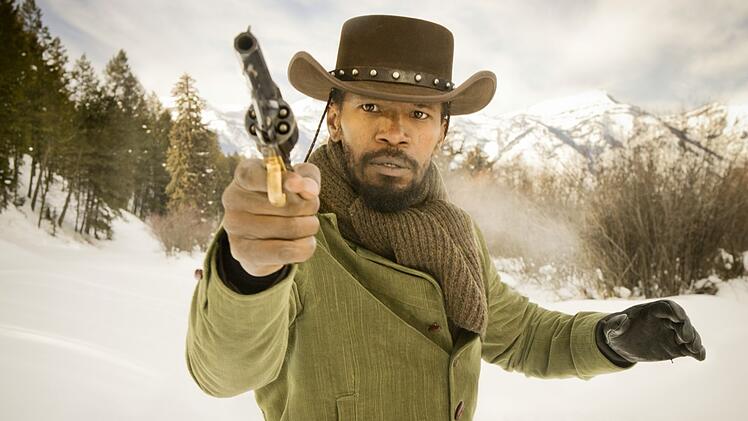 Django (Jamie Foxx) handelt. Er m&ouml;chte sich nicht weiter unterdr&uuml;cken lassen und greift zur Waffe.