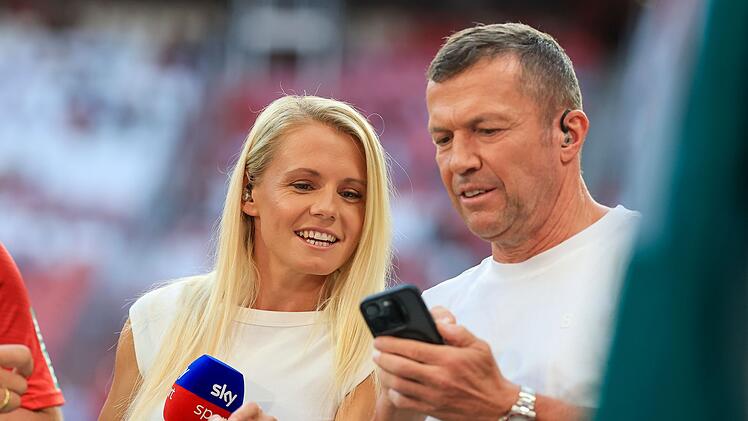Julia Simic und Lothar Matth&auml;us (r)