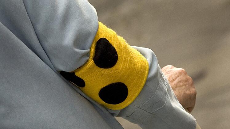 Ein blinder Mann fragte nur nach Hilfe, um ein Taxi zu rufen. Daraufhin wurde er geschlagen und ausgeraubt. Die Polizei sucht nun den Täter. Foto: Arno Burgi/dpa-Zentralbild/dpa
