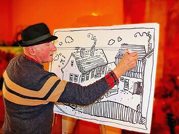 Konny Albert, Multitalent aus Hammelburg, war Gast beim Erzählcafé im Haus  Sankt Michael. Er bewies sein Talent als Grafiker, das hat er ja studiert,  aber auch als Bänkelsänger und als Musiker und Erzähler. Foto: Dieter Britz