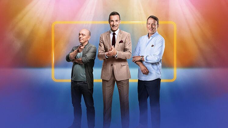 Die erfolgreiche Quizshow "Wer weiß denn sowas" startet am Montag, 13. Oktober, in die zwölfte Staffel. Fans blicken mit Neugier auf die ersten Ausgaben, denn mit Wotan Wilke Möhring ist ein neuer Teamkapitän mit dabei. Links Bernhard Hoëcker, Mitte Moderator Kai Pflaume.