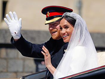 Prinz Harry und seine Frau Meghan. Foto: Phil Noble/AP/dpa