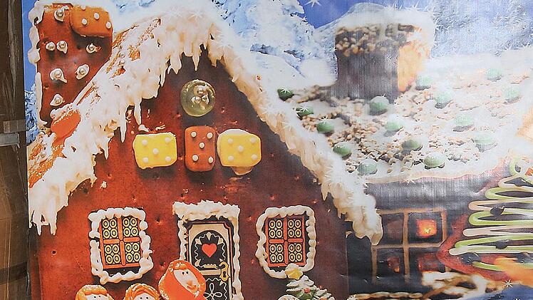 Vor einer winterlichen Kulisse mit viel Schnee konnten sich Kinder auf einem Schlitten fotografieren lassen. Foto: Dieter Britz