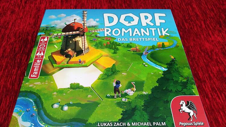 Spiele-Test Dorfromantik - das Brettspiel:  Entspannter Landschaftsbau mit Sogwirkung