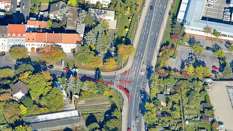 Die roten Markierungen zeigen, was baulich verändert wurde: eine "aufschraubbare" Mittelinsel  bis zur Sichtachse an die Starkenfeldstraße, außerdem links und rechts markierte Sperrflächen an der Annastraße. Luftaufnahme: Ronald Rinklef