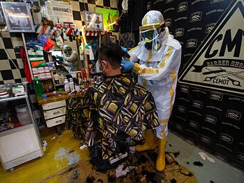 Friseurbesuch in Zeiten von Corona Symbolbild: Muhmmad Zaenuddin/dpa