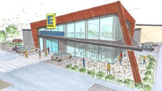 Eine zweigeschossige Glasfassade f&uuml;r den Caf&eacute;bereich, eingefasst von Cortenstahl-Platten: So soll sich der neue Edeka-Markt zum Kanonenweg hin pr&auml;sentieren. Mit Ulrich M&uuml;ller zeichnet ein Coburger Architekt f&uuml;r die Planungen verantwortlich. Grafik: Ulrich M&uuml;ller Architekten