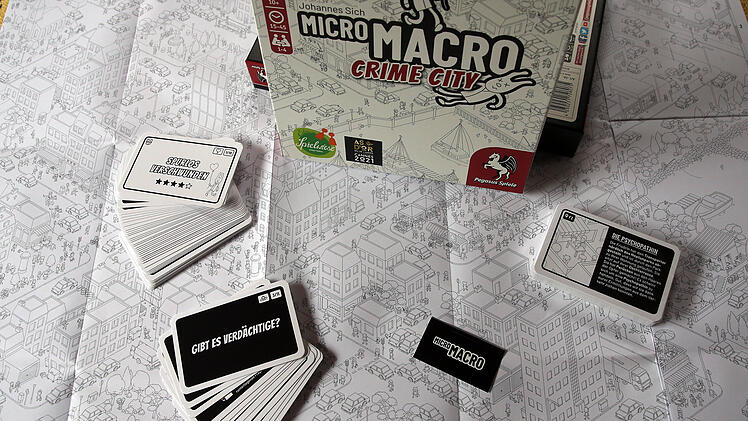Spiel des Jahres 2021 -  MicroMacro: Crime City und Paleo