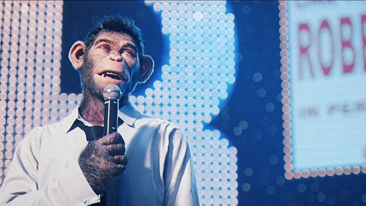 Robbie wird mit Take That zum international gefeierten Star, m&ouml;chte aber lieber seine eigenen Songs singen.
