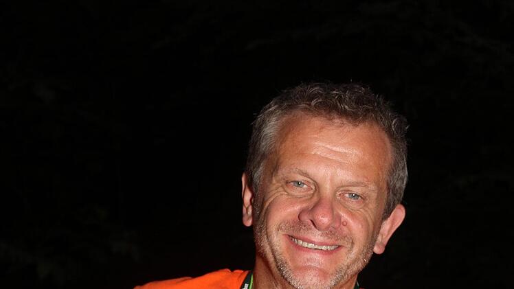 Markus Franz vom Tourismusverband Frankenwald ist auch um Mitternacht noch zuversichtlich: "Die H&auml;lfte der Teilnehmer bew&auml;ltigt die ganze Strecke!" Foto: Sonny Adam