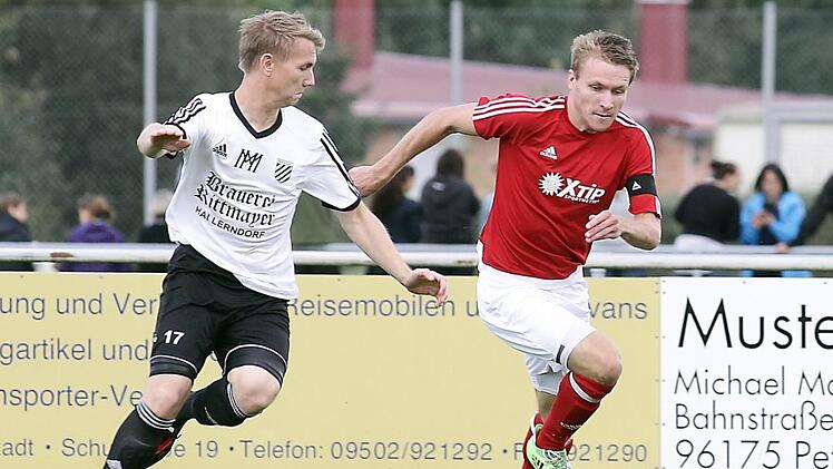 Matthias Baldauf (l.) im Laufduell mit dem Lisberger Stanislaw Nikiforow