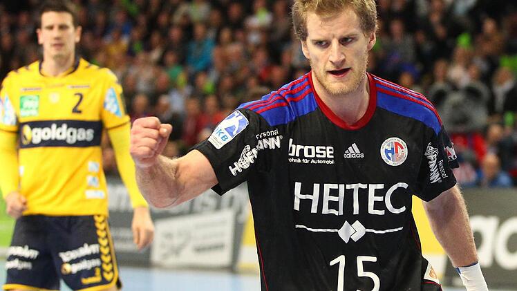 Christoph Nienhaus und dem HC Erlangen gelang ein phänomenaler 27:25-Sieg gegen die Rhein-Neckar Löwen.  Fotos: Sportfoto Zink