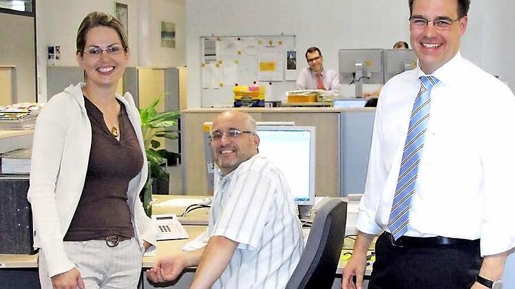 Die Mitarbeiter der Abteilung Aktuariat Komposit mögen Mathematik und haben Spaß daran (von links): Kati Geisler, Alexander Schenk und Abteilungsleiter Jörg Rheinländer.