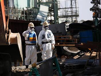 Arbeiter im Atomkraftwerk Fukushima Foto: Issei Kato/dpa