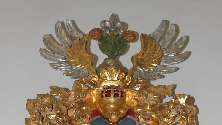 Das Wappen der Familie Handel mit dem Stierkopf unten in der Mitte erinnert an die Weismainer Zeit dieser heute über ganz Europa verzweigten Familie.