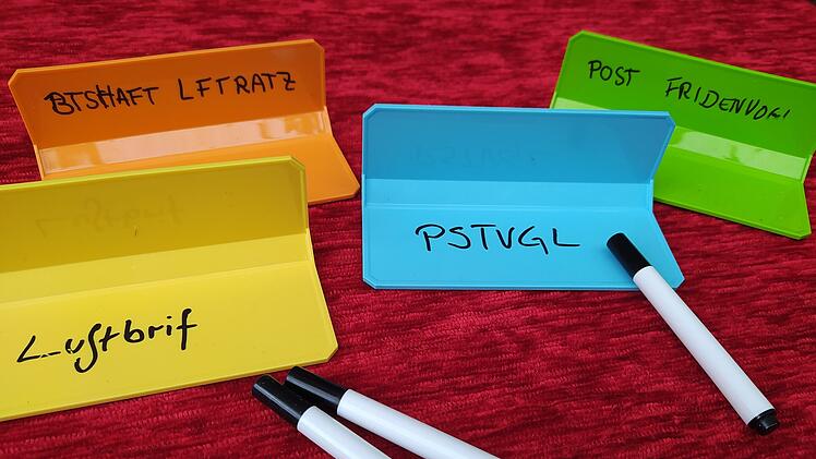 Spiele-Test Less is More: Rezension des kreativen Party-Wortspiels