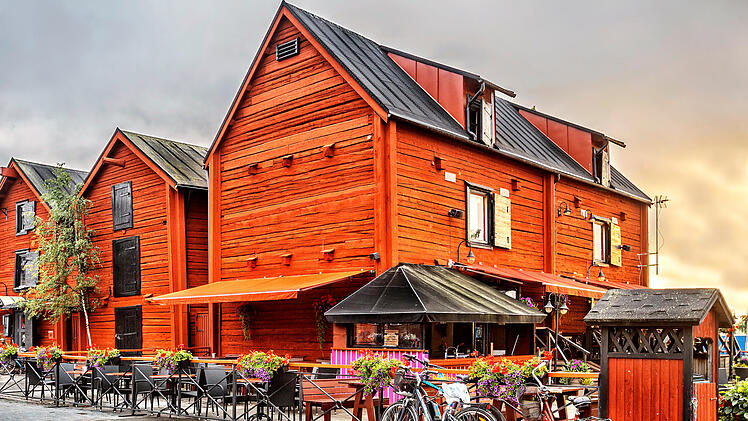 Old wooden houses in the old center around the harbor of Oulu.