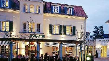 Eine der beiden Villen aus dem späten 19. Jahrhundert, die heute als Restaurant zur Hotelanlage gehört.  Foto: Horst Lange
