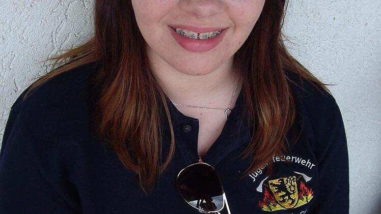 Michelle, 13 Jahre: " "Auch ich möchte einmal als Neustadterin die Deutsche Jugendleistungsspanne erringen. Bei der Feuerwehr bin ich unter Leuten und der Zusammenhalt gefällt mir." Foto: Doris Weidner