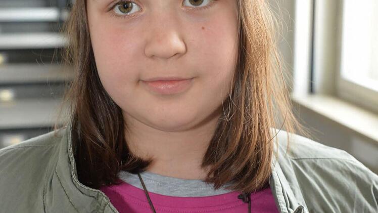 Kiara (10): "Ich möchte mal Philosophin werden. Wo ich bisher aber noch gar nicht darüber nachgedacht habe, ist, wie man nach dem Tod aussieht. Ich glaube, man ist dann ein heller Lichtpunkt oder so etwas in der Art." Foto: Ronald Rinklef